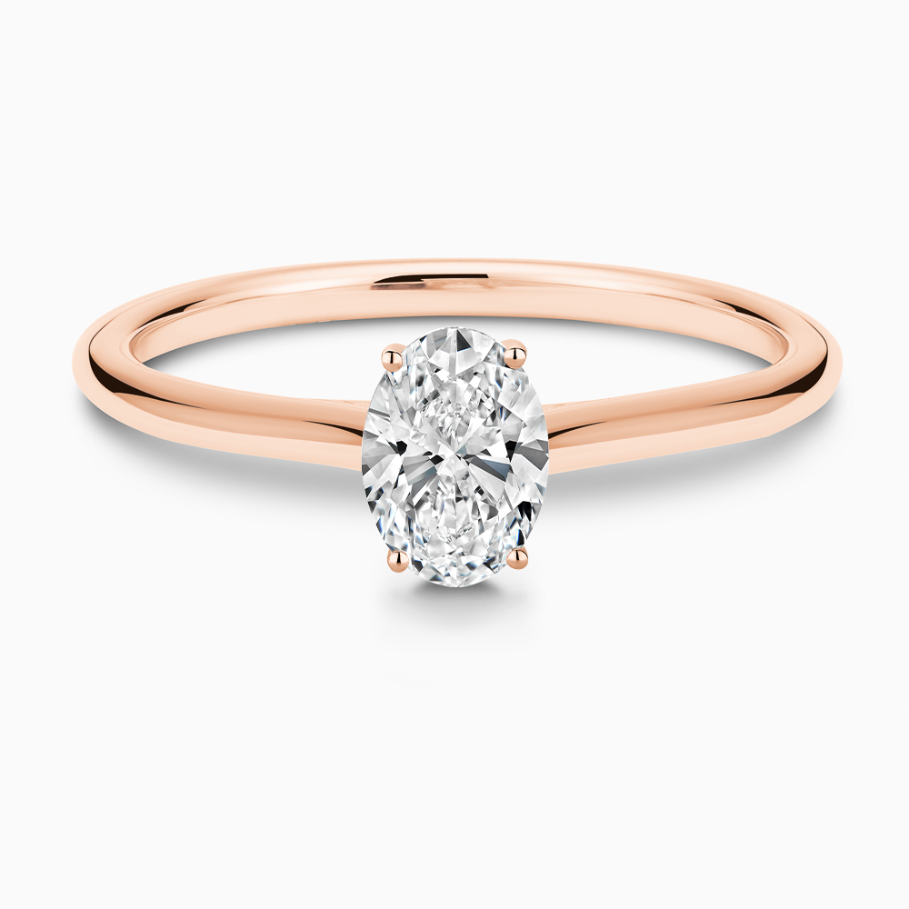 The Ecksand Thick Diamond Engagement Ring with Diamond Bridge and Cathedral Setting shown with Oval in 14k Rose Gold