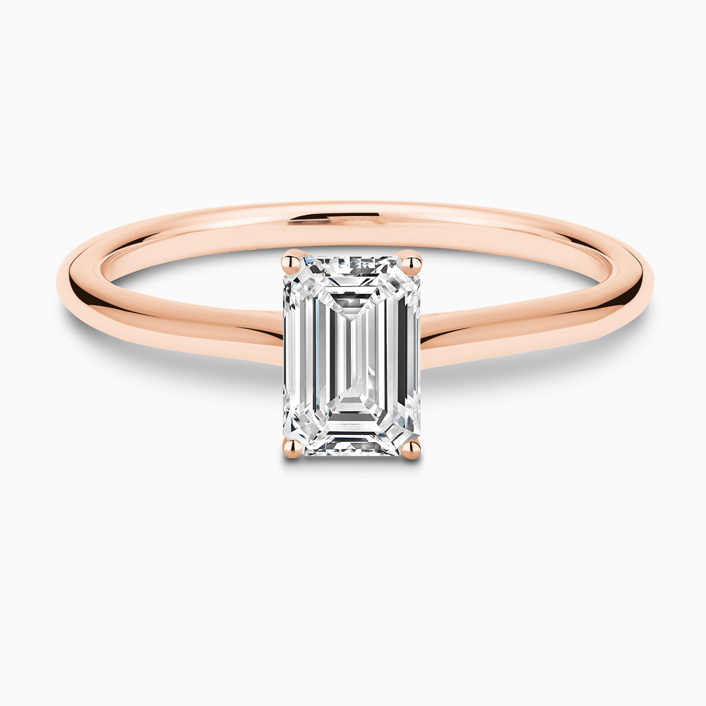 The Ecksand Iconic Diamond Engagement Ring with Diamond Bridge and Cathedral Setting shown with Emerald in 14k Rose Gold
