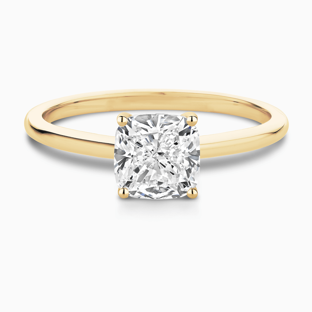 The Ecksand Solitaire Diamond Engagement Ring with Hidden Diamond shown with Cushion in 18k Yellow Gold