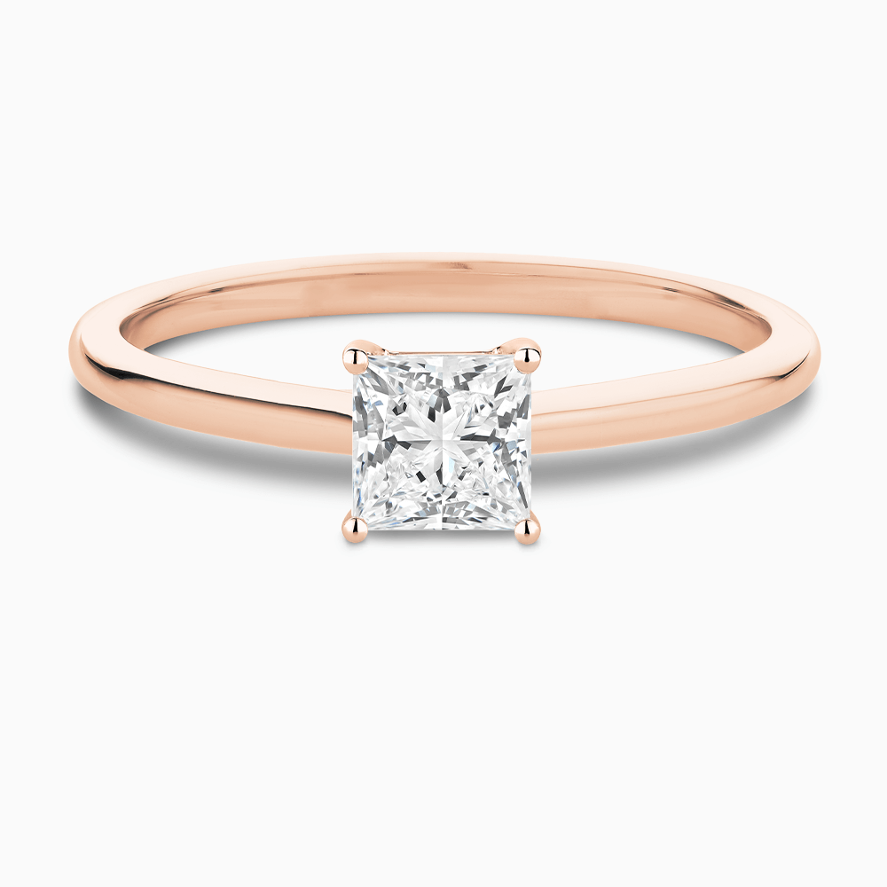 The Ecksand Solitaire Diamond Engagement Ring with Hidden Diamond shown with Princess in 14k Rose Gold