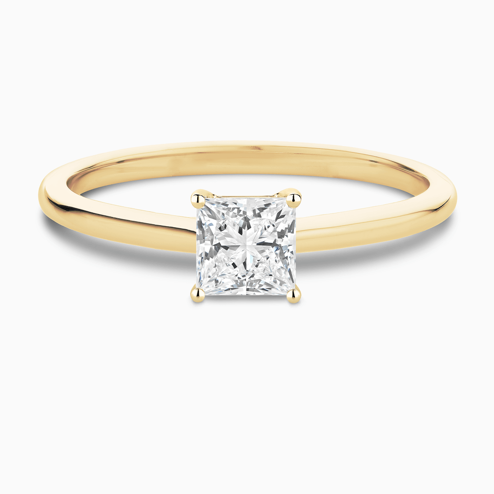The Ecksand Solitaire Diamond Engagement Ring with Hidden Diamond shown with Princess in 18k Yellow Gold