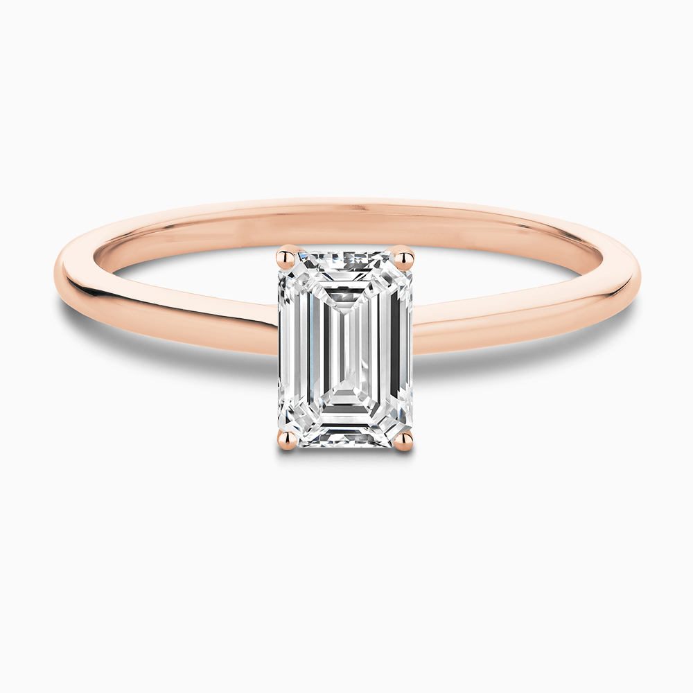 The Ecksand Solitaire Diamond Engagement Ring with Hidden Diamond shown with Emerald in 14k Rose Gold