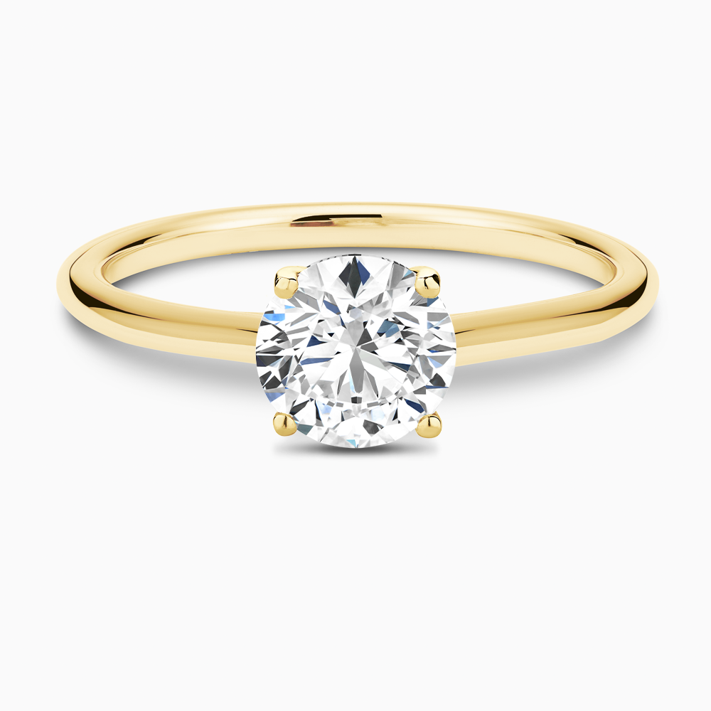 The Ecksand Iconic Diamond Engagement Ring with Diamond Bridge and Cathedral Setting shown with Round in 18k Yellow Gold