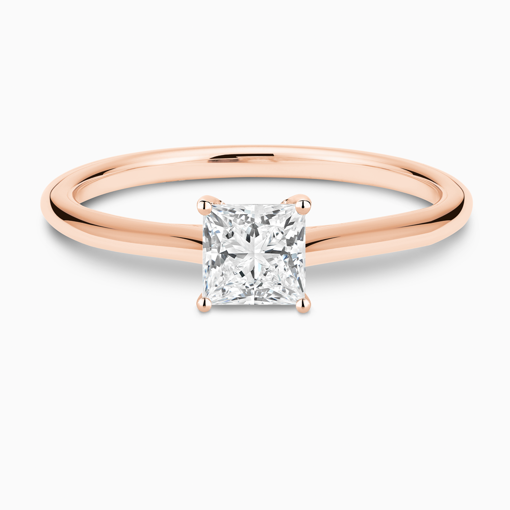 The Ecksand Iconic Diamond Engagement Ring with Diamond Bridge and Cathedral Setting shown with Princess in 14k Rose Gold