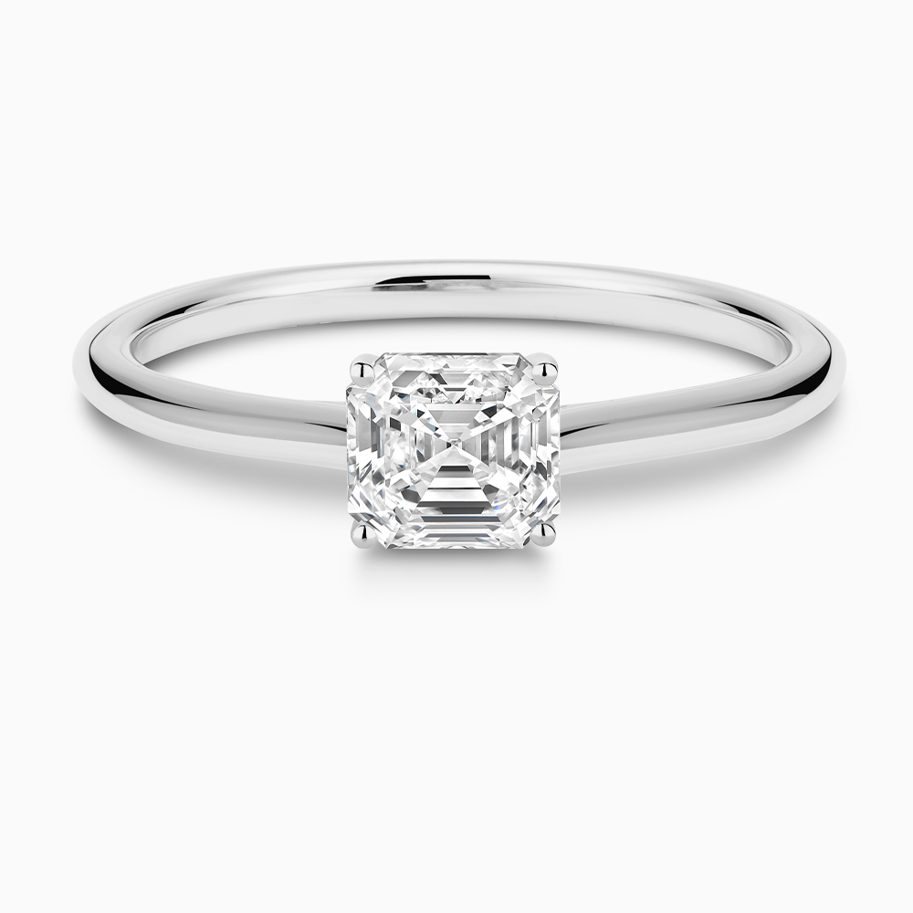 The Ecksand Iconic Diamond Engagement Ring with Diamond Bridge and Cathedral Setting shown with Asscher in Platinum