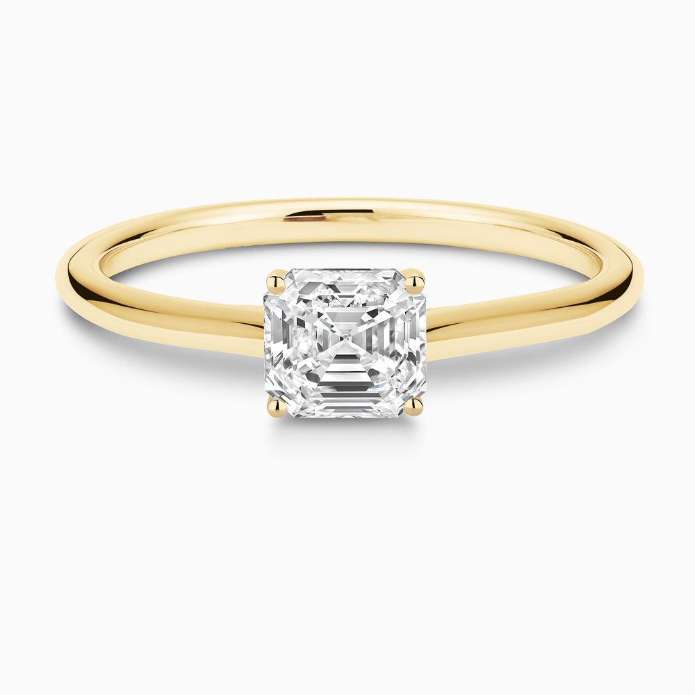 The Ecksand Iconic Diamond Engagement Ring with Diamond Bridge and Cathedral Setting shown with Asscher in 18k Yellow Gold