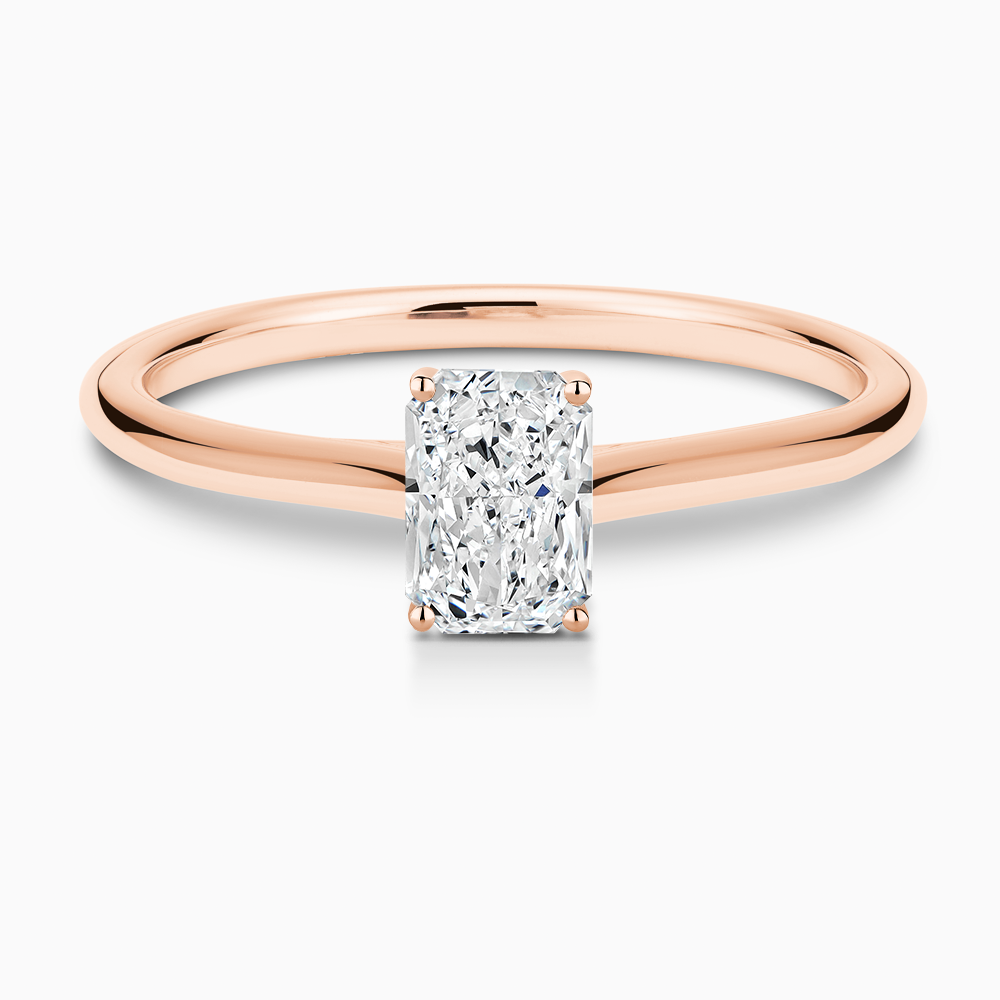 The Ecksand Iconic Diamond Engagement Ring with Diamond Bridge and Cathedral Setting shown with Radiant in 14k Rose Gold
