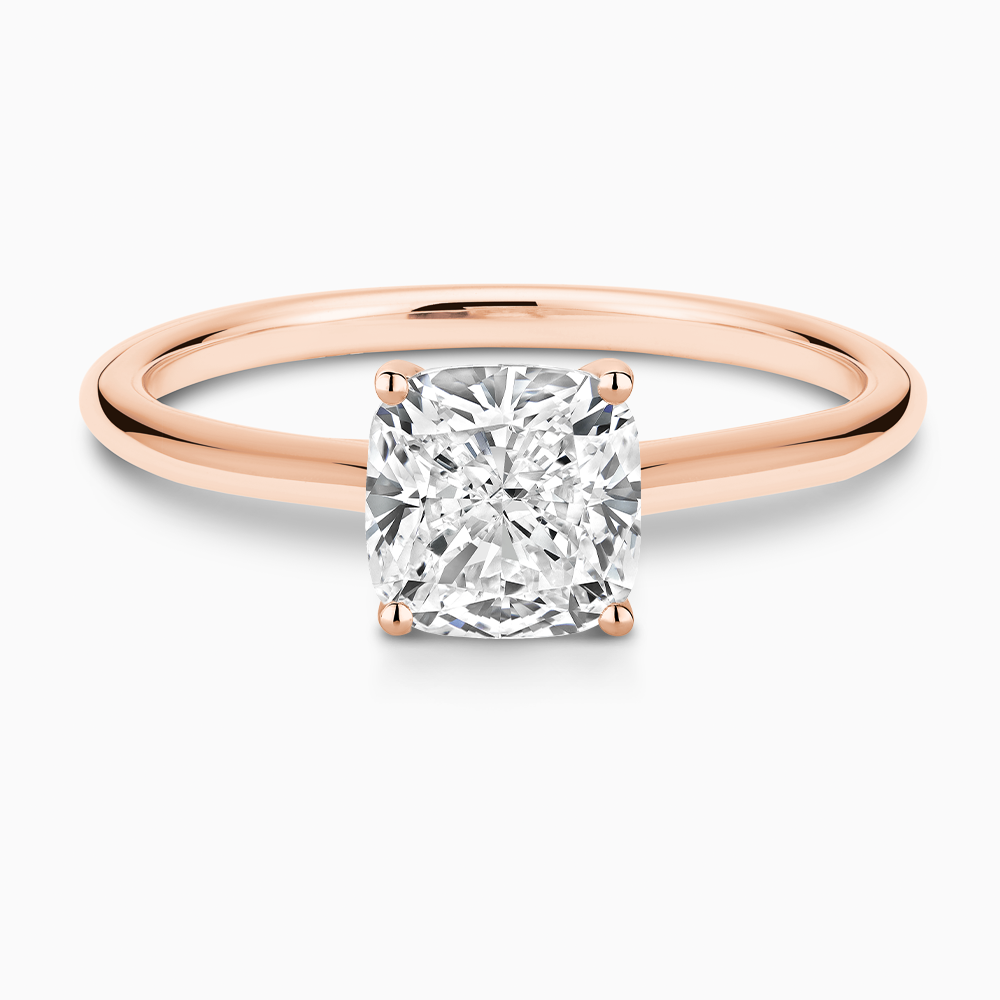 The Ecksand Iconic Diamond Engagement Ring with Diamond Bridge and Cathedral Setting shown with Cushion in 14k Rose Gold