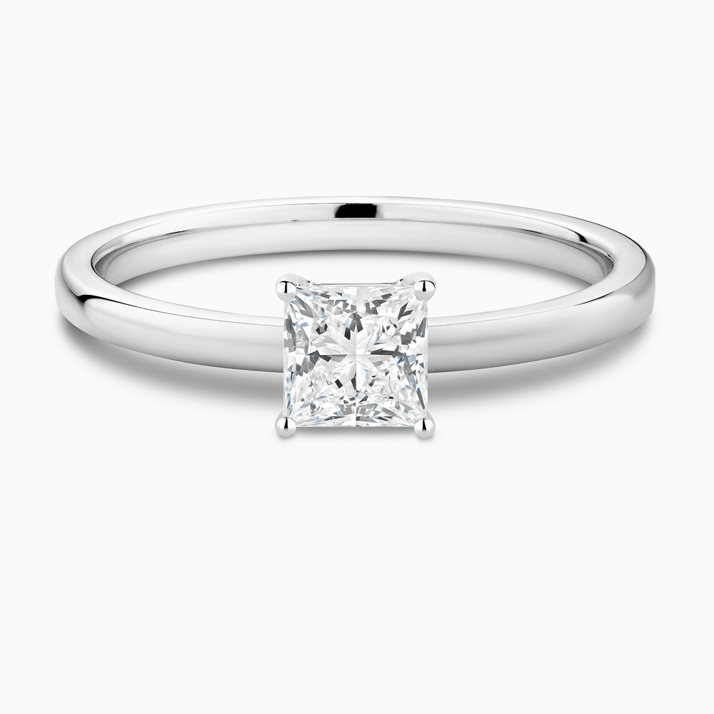 The Ecksand Solitaire Diamond Engagement Ring with Diamond Pavé Basket Setting shown with Princess in Platinum