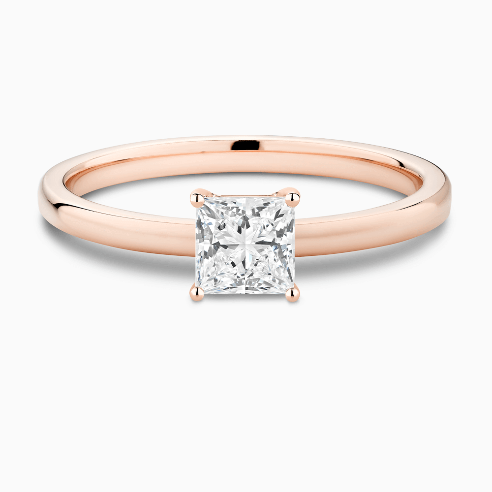 The Ecksand Solitaire Diamond Engagement Ring with Diamond Pavé Basket Setting shown with Princess in 14k Rose Gold