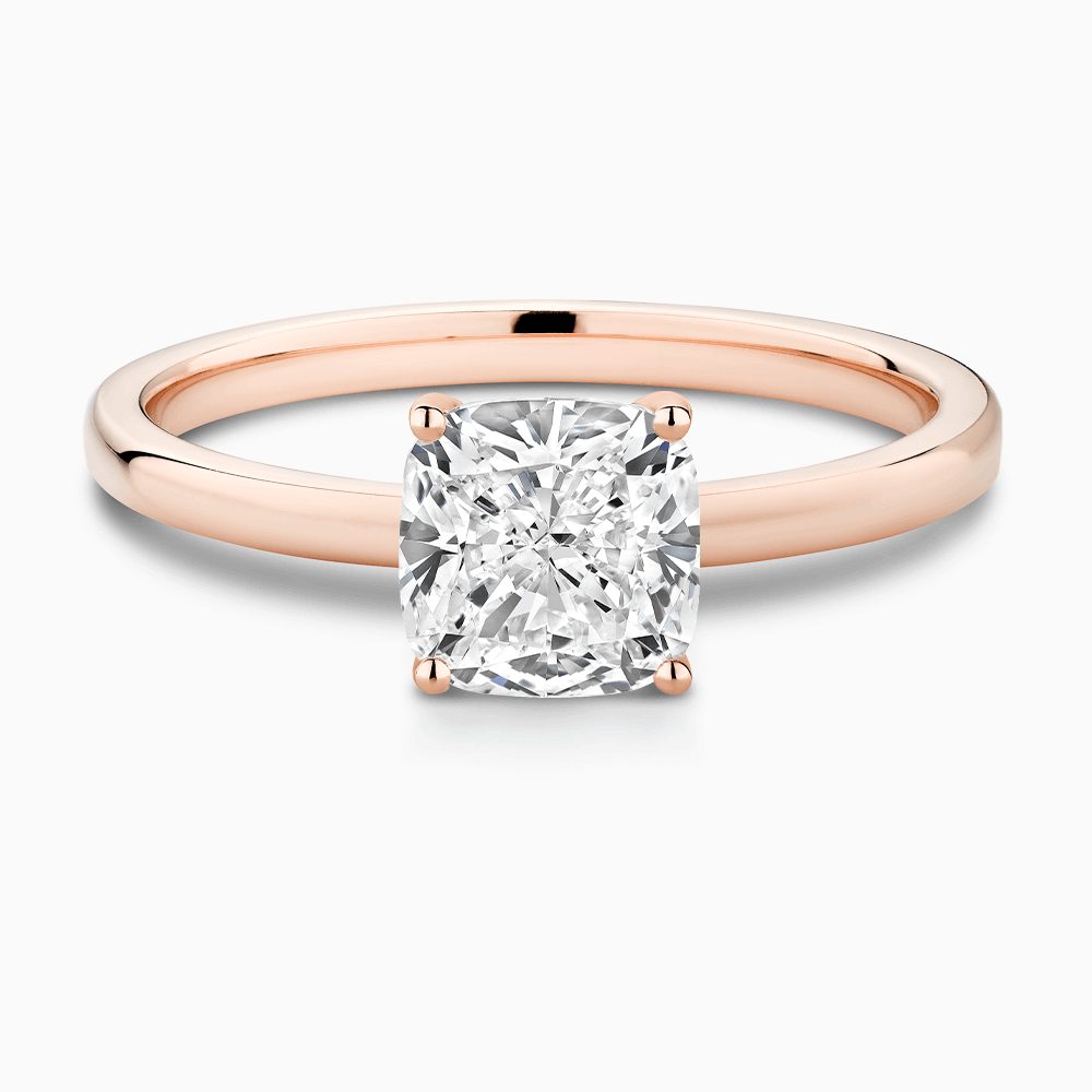 The Ecksand Solitaire Diamond Engagement Ring with Diamond Pavé Basket Setting shown with Cushion in 14k Rose Gold