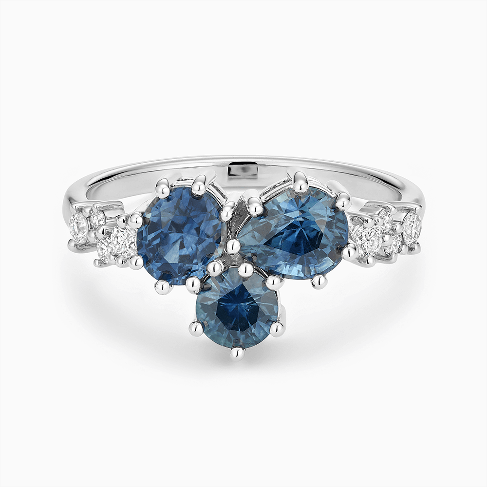 The Ecksand Montana Sapphire Cluster Engagement Ring with Side Diamonds shown with Lab-grown VS2+/ F+ in 18k White Gold