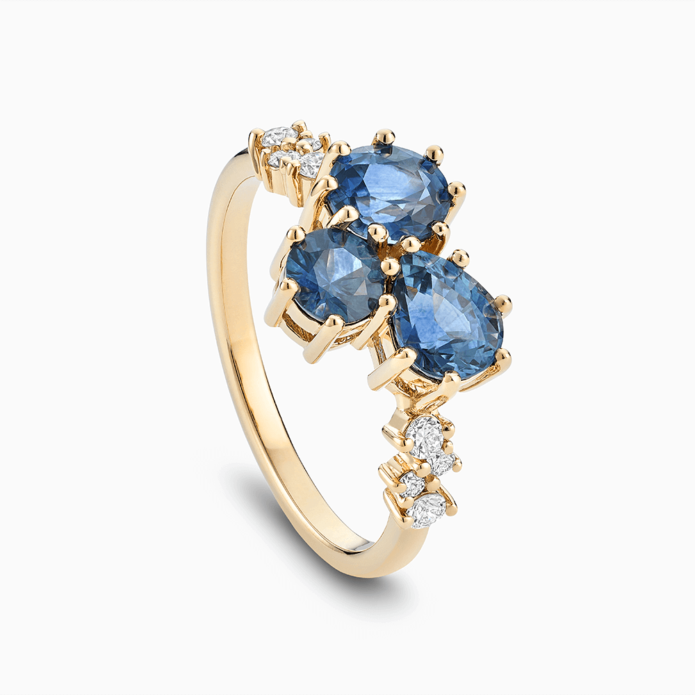 The Ecksand Montana Sapphire Cluster Engagement Ring with Side Diamonds shown with  in 