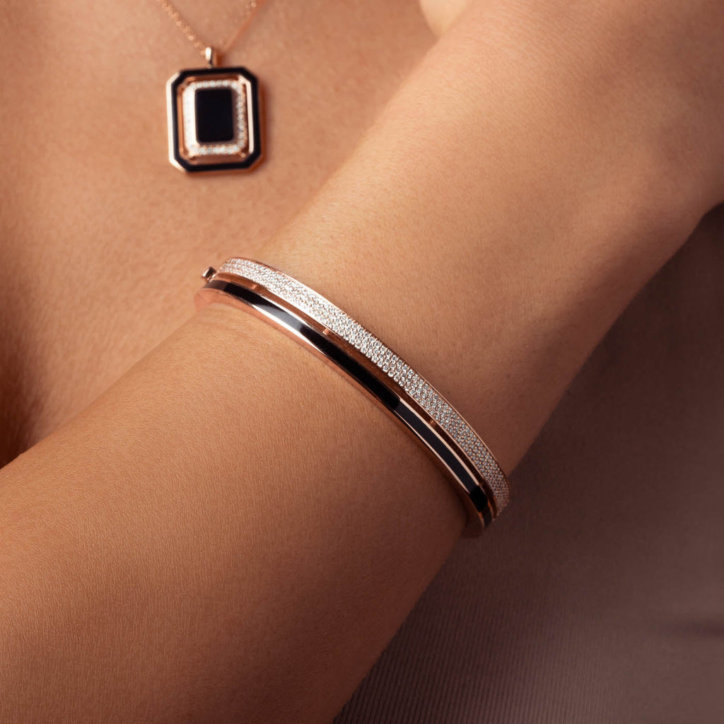 The Ecksand Black Enamel Bangle with Diamond Pavé shown with  in 