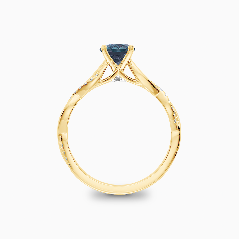 The Ecksand Blue Sapphire Engagement Ring with Secret Heart and Twisted Diamond Band shown with  in 