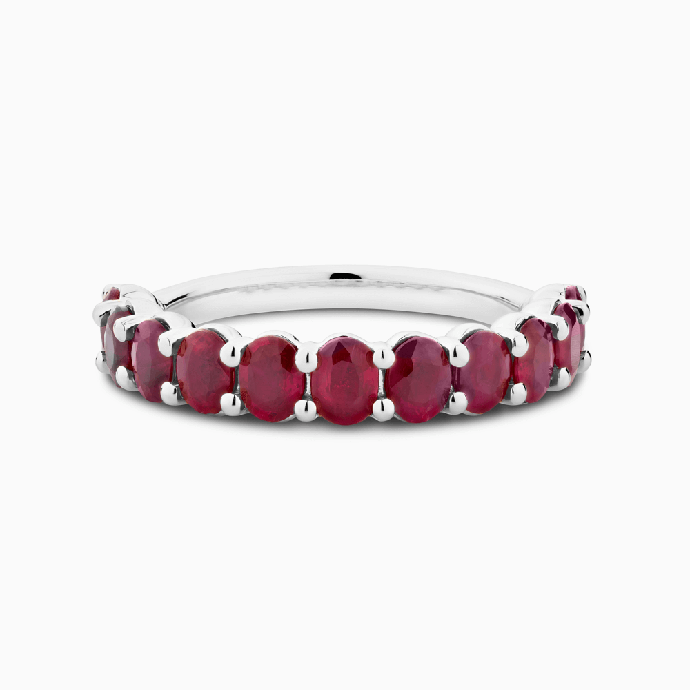 The Ecksand Oval Ruby Semi-Eternity Ring shown with  in Platinum