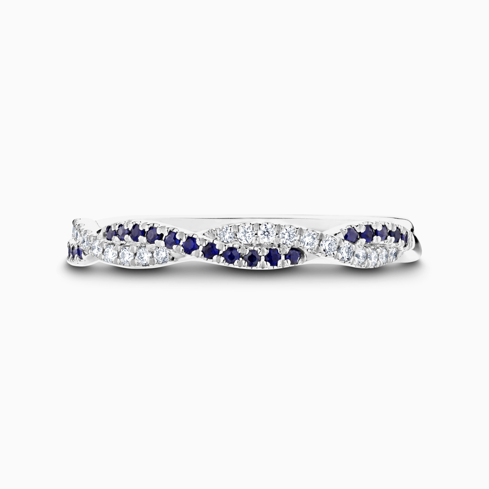 The Ecksand Twisted Wedding Ring with Accent Blue Sapphires and Diamonds shown with  in Platinum