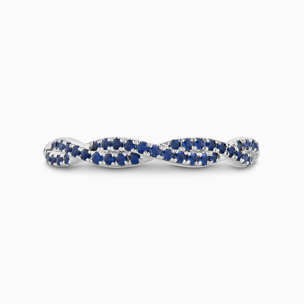 The Ecksand Twisted Eternity Ring with Blue Sapphire Pavé shown with  in Platinum
