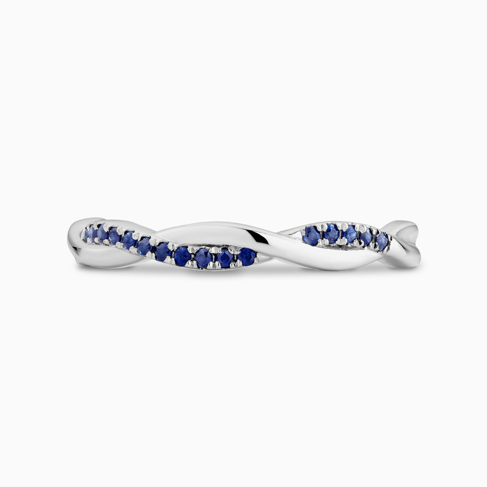 The Ecksand Twisted Eternity Ring with Accent Blue Sapphires shown with  in Platinum