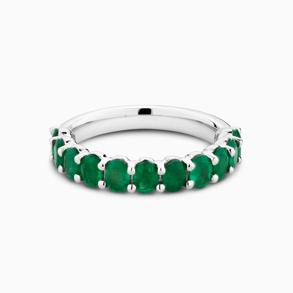 The Ecksand Oval Emerald Semi-Eternity Ring shown with  in Platinum