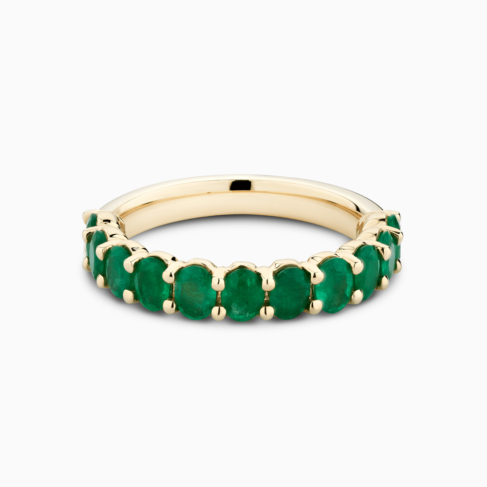The Ecksand Oval Emerald Semi-Eternity Ring shown with  in 18k Yellow Gold
