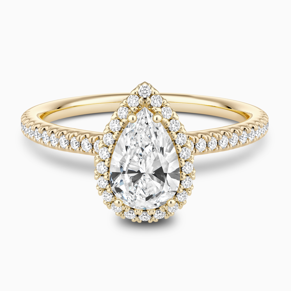 The Ecksand Diamond Halo Engagement Ring with Diamond Band shown with Pear in 18k Yellow Gold