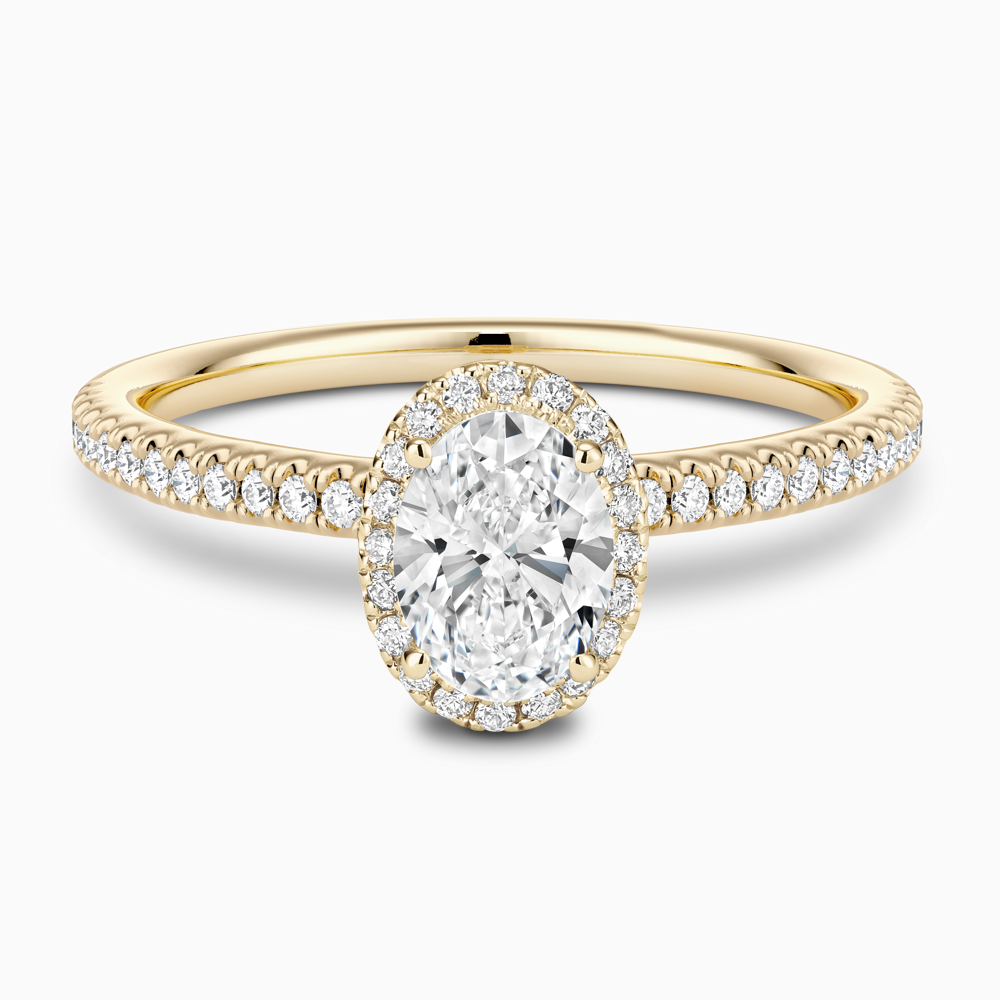 The Ecksand Diamond Halo Engagement Ring with Diamond Band shown with Oval in 18k Yellow Gold