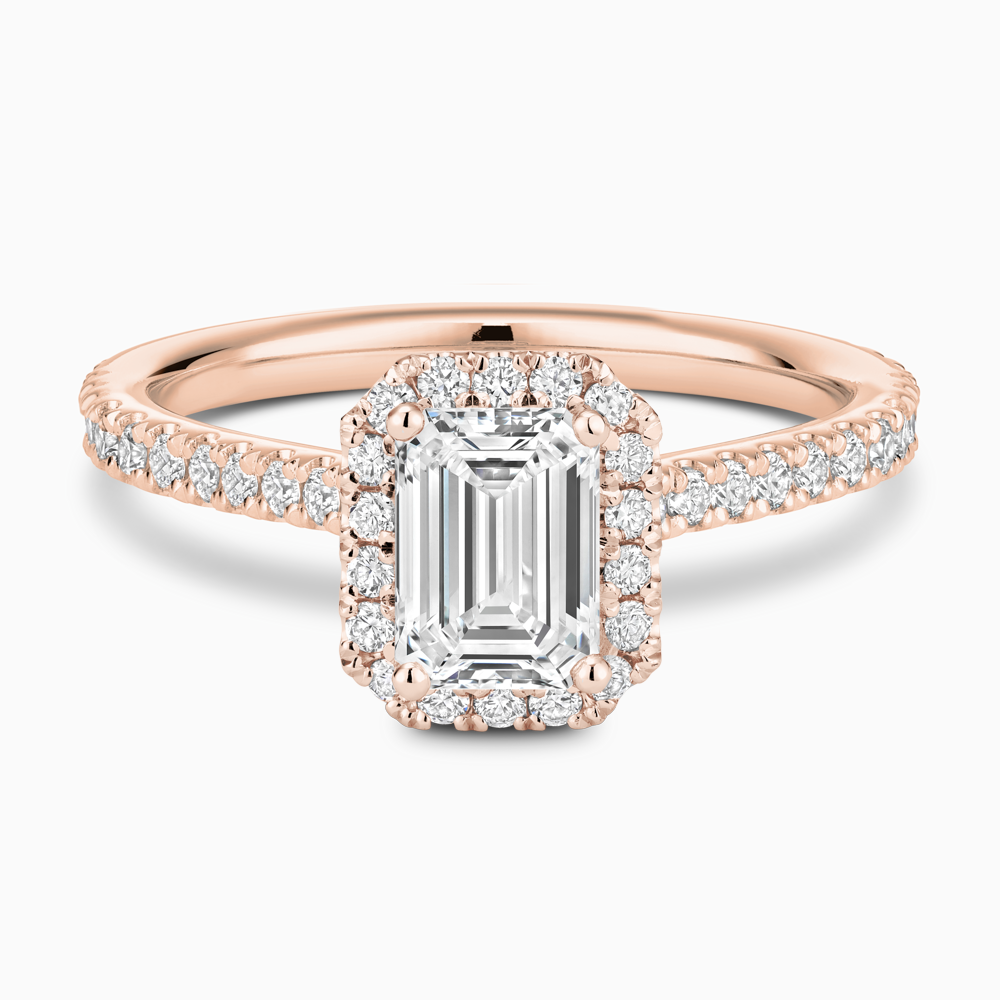 The Ecksand Iconic Diamond Engagement Ring with Halo and Diamond Pavé shown with Emerald in 14k Rose Gold