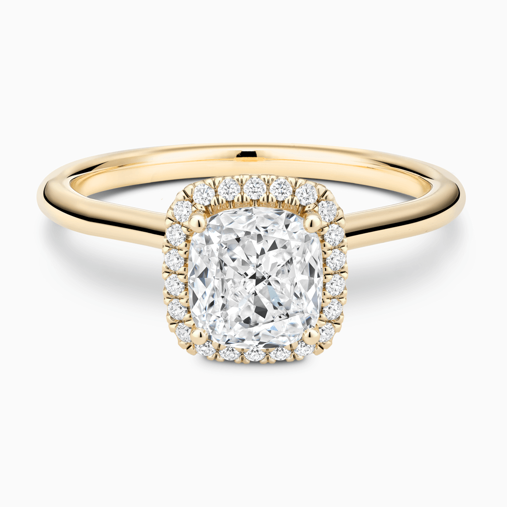 The Ecksand Cathedral-Setting Engagement Ring with Diamond Halo shown with Cushion in 18k Yellow Gold