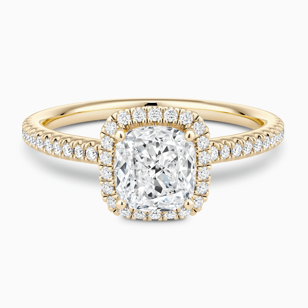 The Ecksand Diamond Halo Engagement Ring with Diamond Band shown with Cushion in 18k Yellow Gold