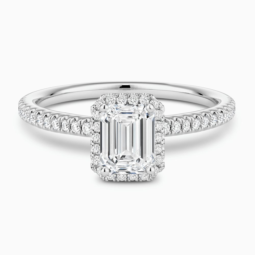 The Ecksand Diamond Halo Engagement Ring with Diamond Band shown with Emerald in Platinum