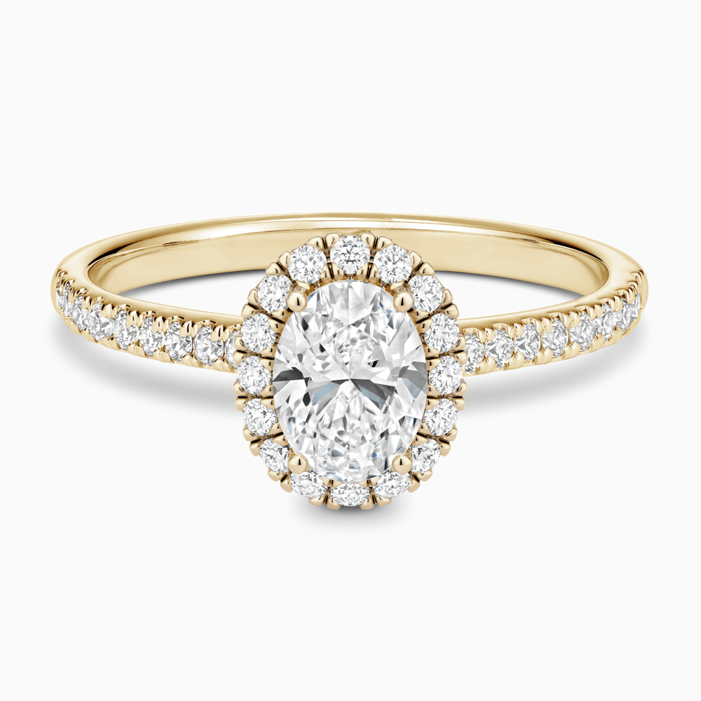 The Ecksand Diamond Engagement Ring with Diamond Halo, Pavé and Bridge shown with Oval in 18k Yellow Gold