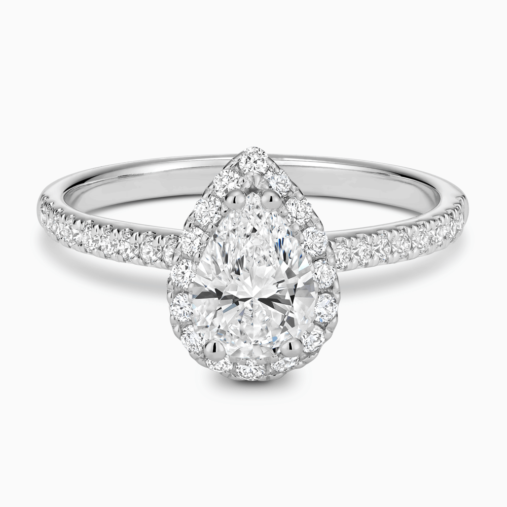 The Ecksand Diamond Engagement Ring with Diamond Halo, Pavé and Bridge shown with Pear in Platinum