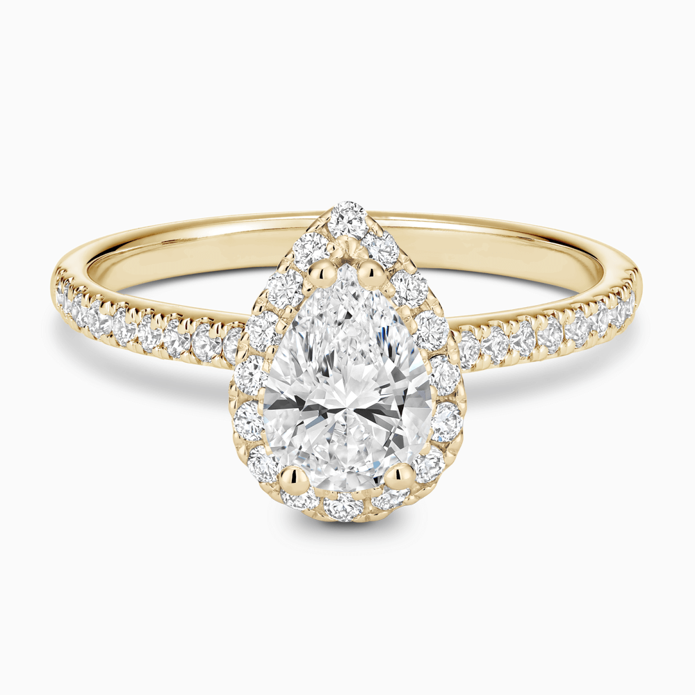 The Ecksand Diamond Engagement Ring with Diamond Halo, Pavé and Bridge shown with Pear in 18k Yellow Gold