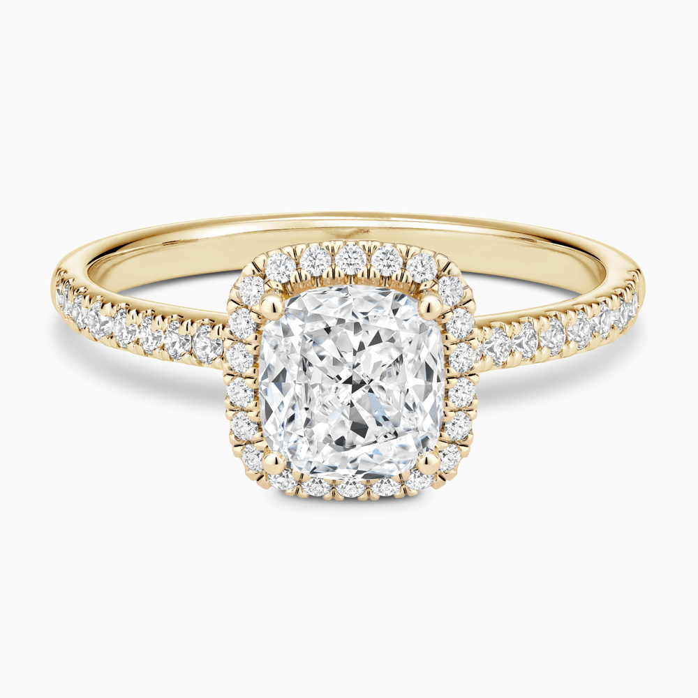 The Ecksand Diamond Engagement Ring with Diamond Halo, Pavé and Bridge shown with Cushion in 18k Yellow Gold