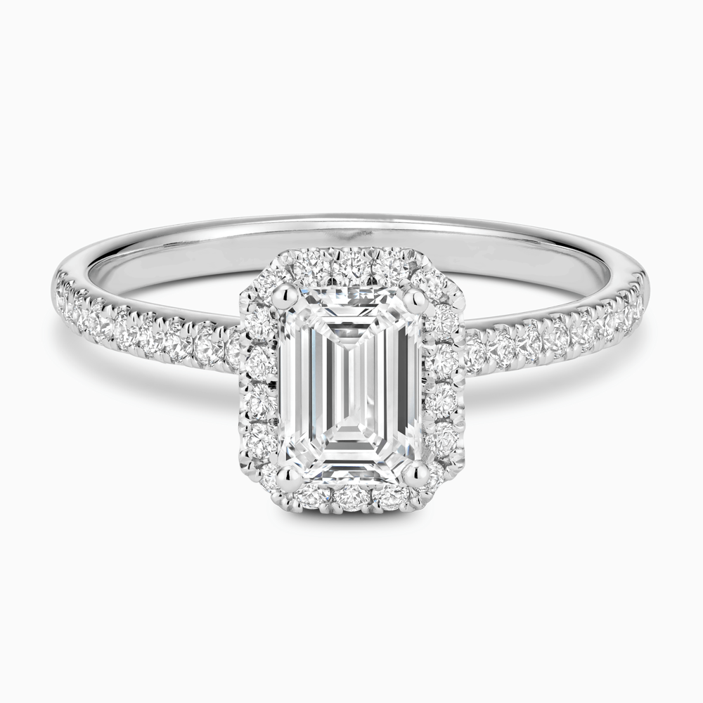 The Ecksand Diamond Engagement Ring with Diamond Halo, Pavé and Bridge shown with Emerald in Platinum