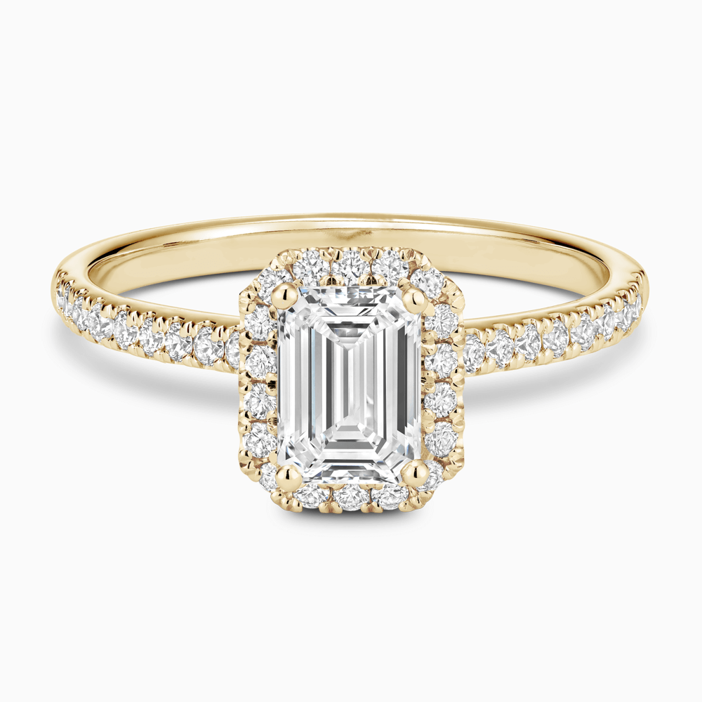 The Ecksand Diamond Engagement Ring with Diamond Halo, Pavé and Bridge shown with Emerald in 18k Yellow Gold