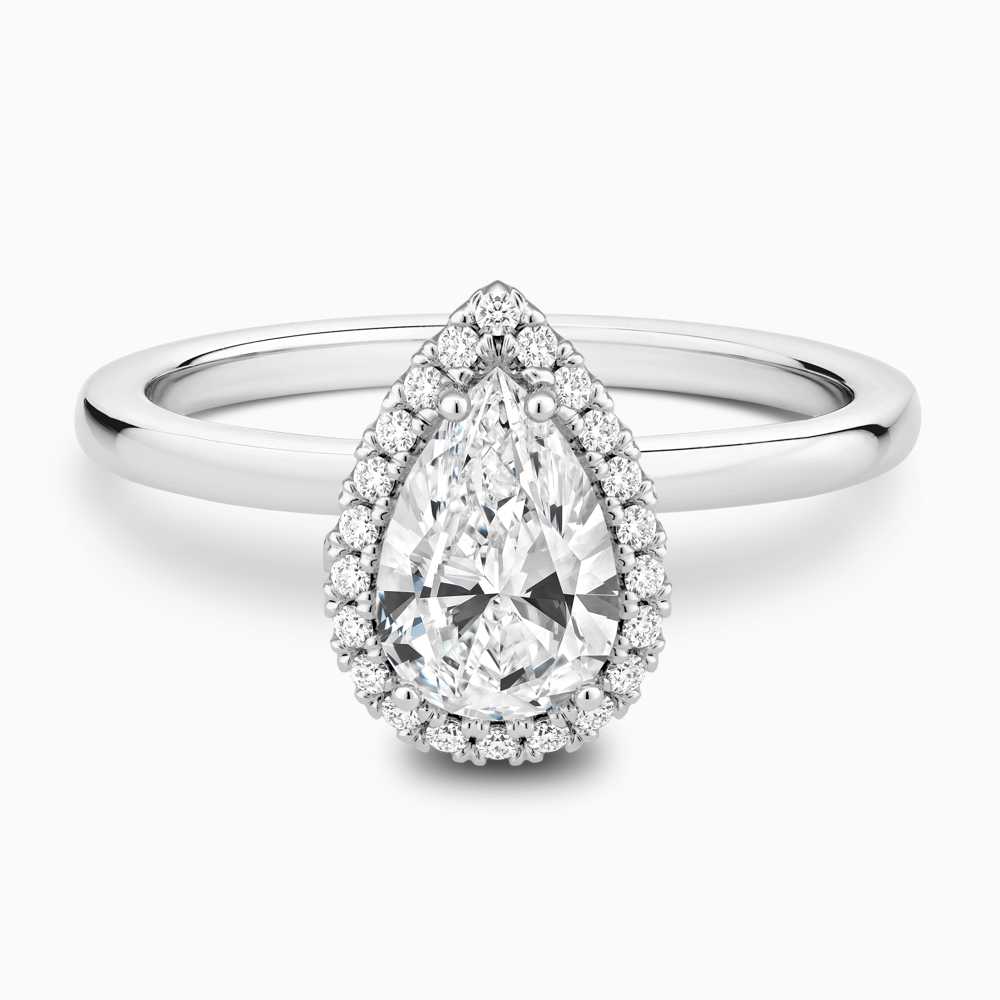 The Ecksand Iconic Diamond Halo Engagement Ring with Plain Band shown with Pear in Platinum