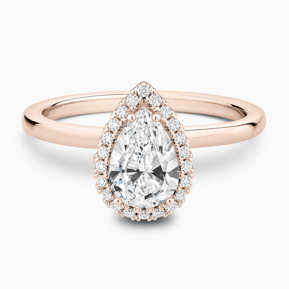 The Ecksand Iconic Diamond Halo Engagement Ring with Plain Band shown with Pear in 14k Rose Gold
