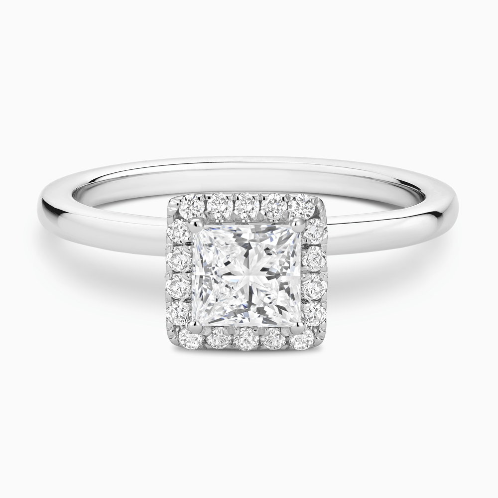 The Ecksand Iconic Diamond Halo Engagement Ring with Plain Band shown with Princess in Platinum