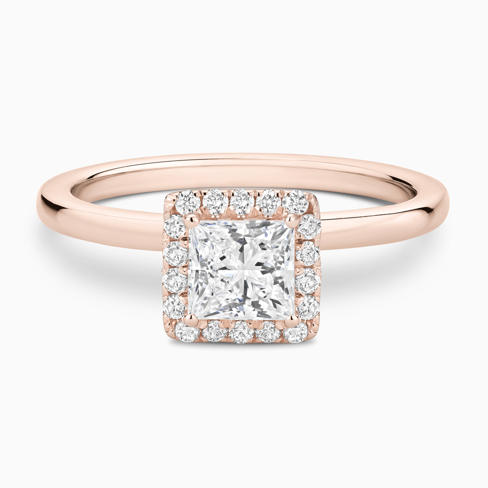 The Ecksand Iconic Diamond Halo Engagement Ring with Plain Band shown with Princess in 14k Rose Gold