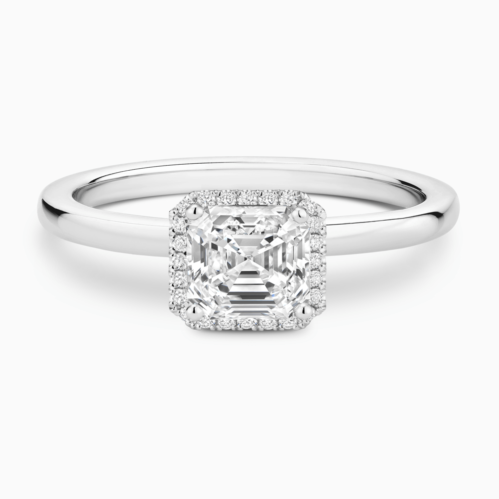 The Ecksand Iconic Diamond Halo Engagement Ring with Plain Band shown with Asscher in Platinum