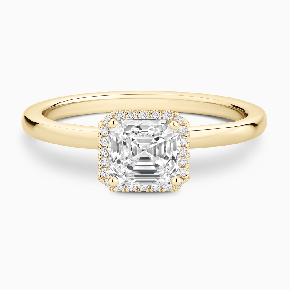 The Ecksand Iconic Diamond Halo Engagement Ring with Plain Band shown with Asscher in 18k Yellow Gold