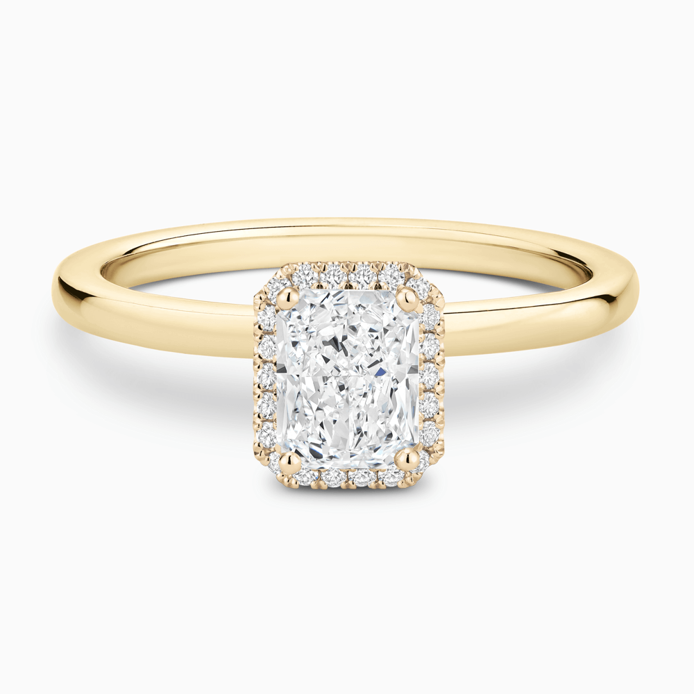 The Ecksand Iconic Diamond Halo Engagement Ring with Plain Band shown with Radiant in 18k Yellow Gold