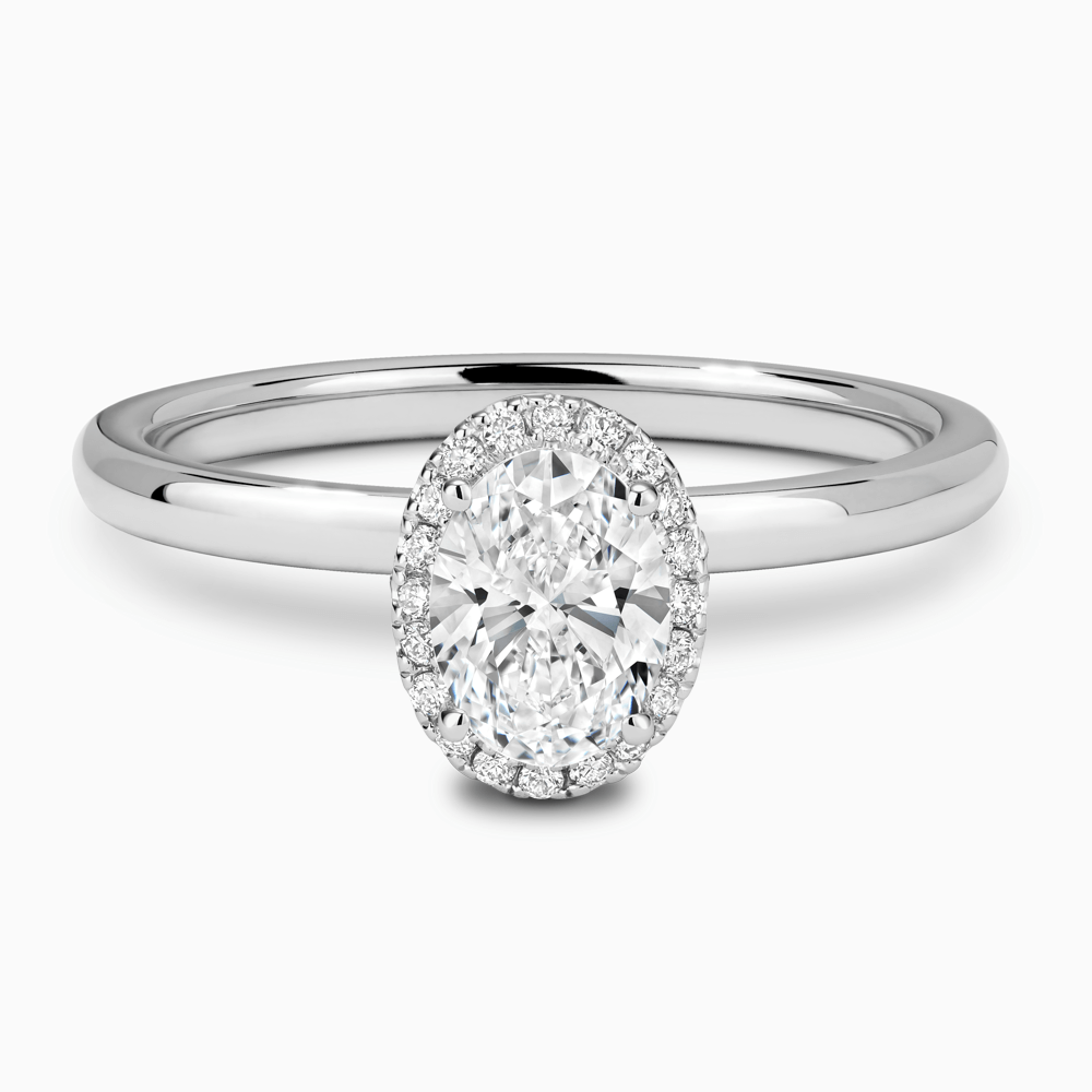 The Ecksand Vintage Engagement Ring with Diamond Halo shown with Oval in Platinum