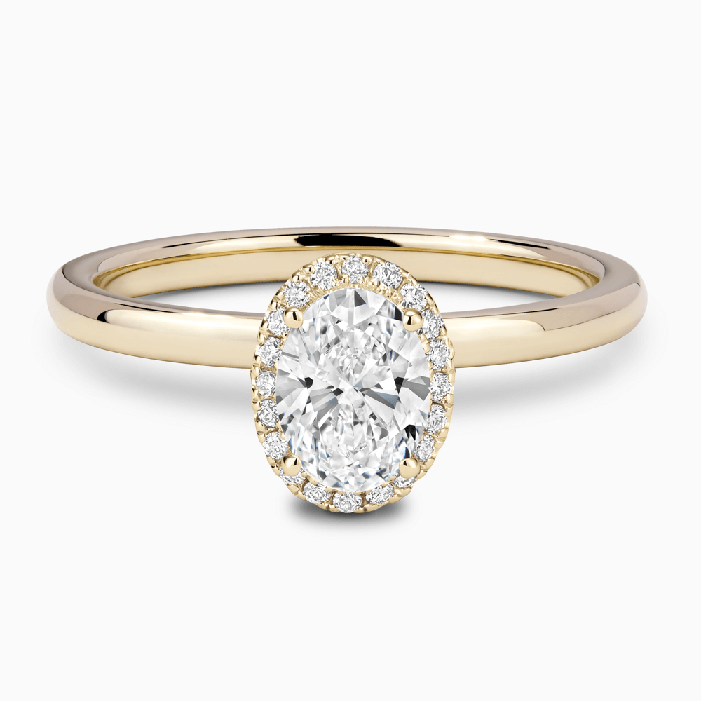 The Ecksand Vintage Engagement Ring with Diamond Halo shown with Oval in 18k Yellow Gold