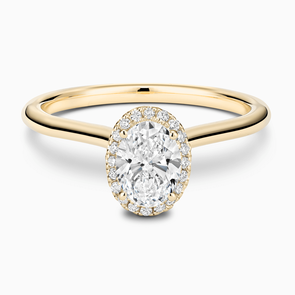 The Ecksand Cathedral-Setting Engagement Ring with Diamond Halo shown with Oval in 18k Yellow Gold