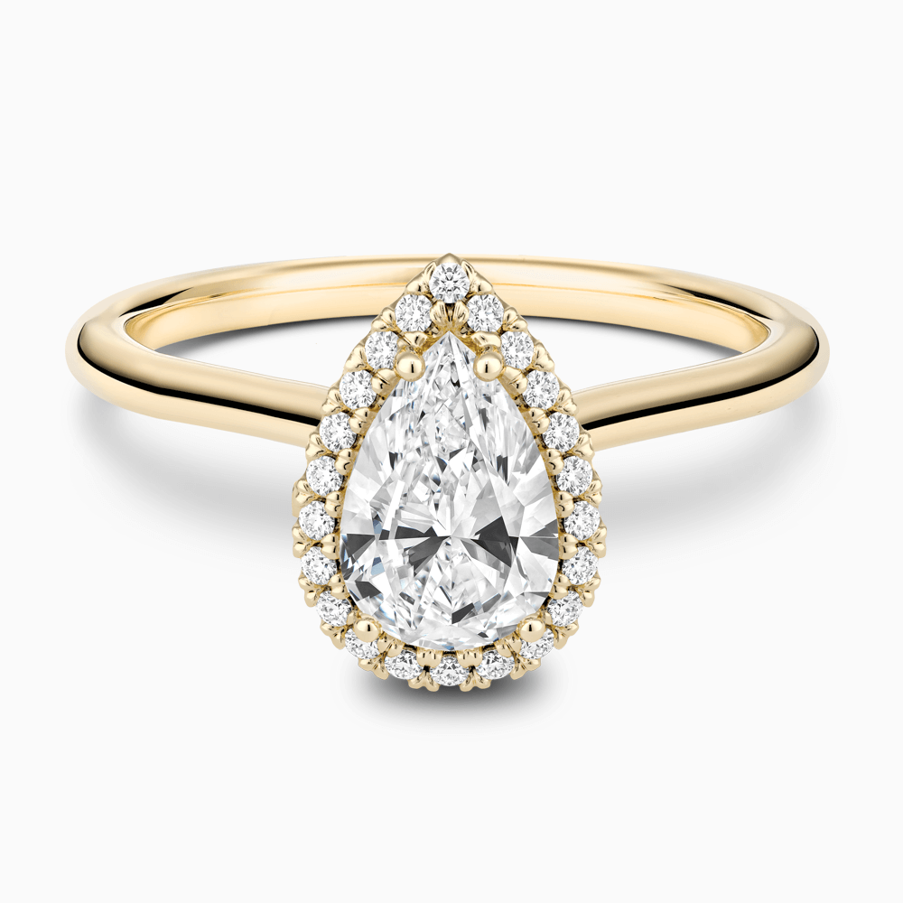 The Ecksand Cathedral-Setting Engagement Ring with Diamond Halo shown with Pear in 18k Yellow Gold
