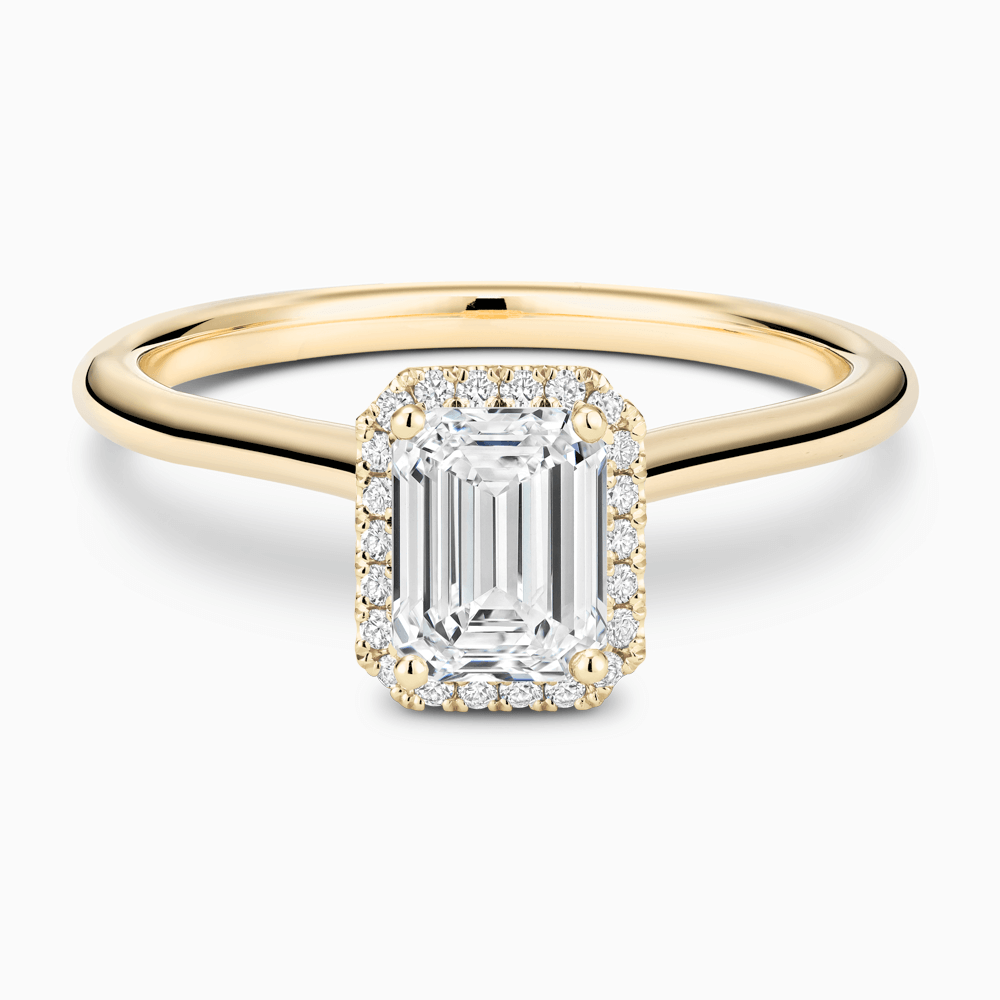 The Ecksand Cathedral-Setting Engagement Ring with Diamond Halo shown with Emerald in 18k Yellow Gold