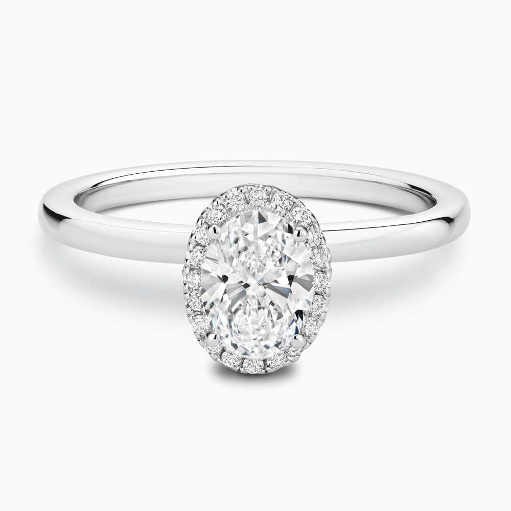 The Ecksand Iconic Diamond Halo Engagement Ring with Plain Band shown with Oval in Platinum